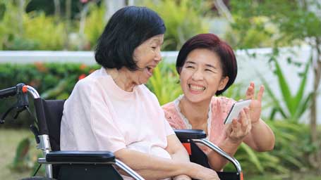 Older woman and her family member caregiver
