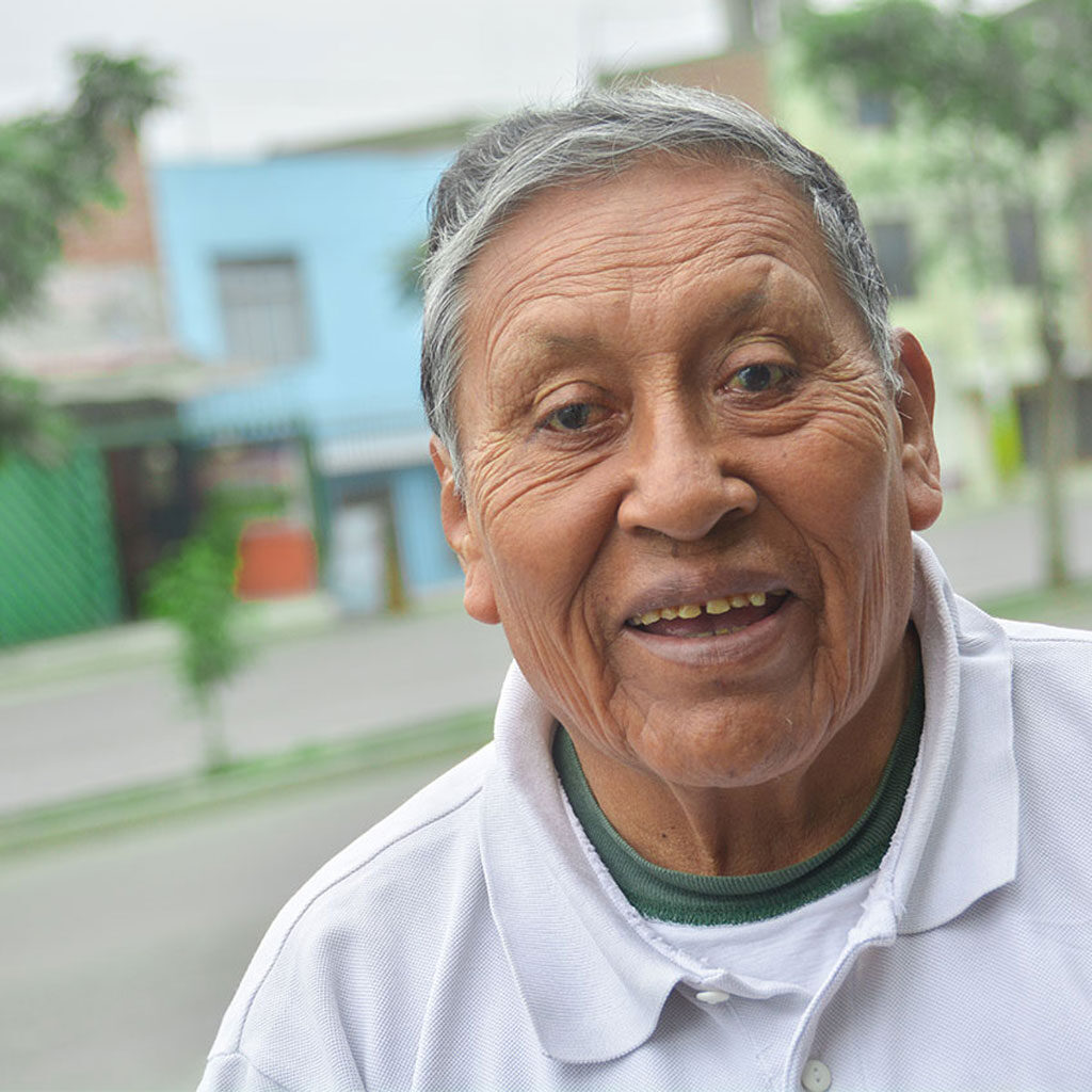 Older Latin man in his community