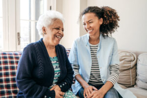 older woman and younger women enjoying each others company