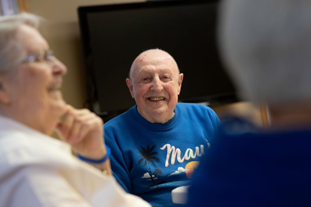 Photo of a man smiling.