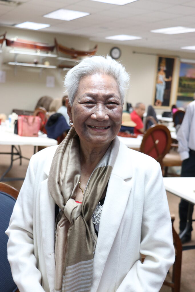 Photo of an older woman smiling.